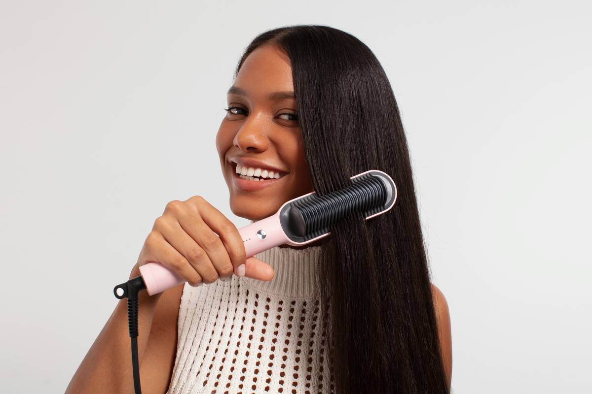 Woman wearing simple headbands while applying morning skincare, showing secure fit and no hairline tension